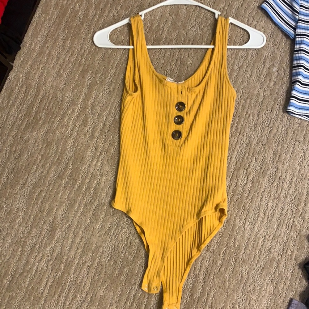 yellow bodysuit